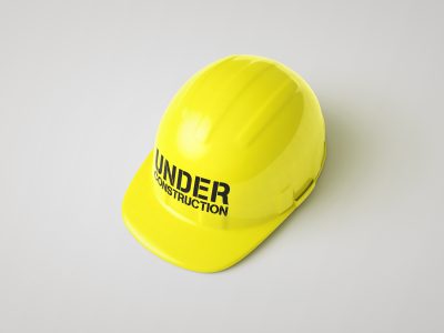 Image of a yellow hard hat to designate our section on our Web Development Service